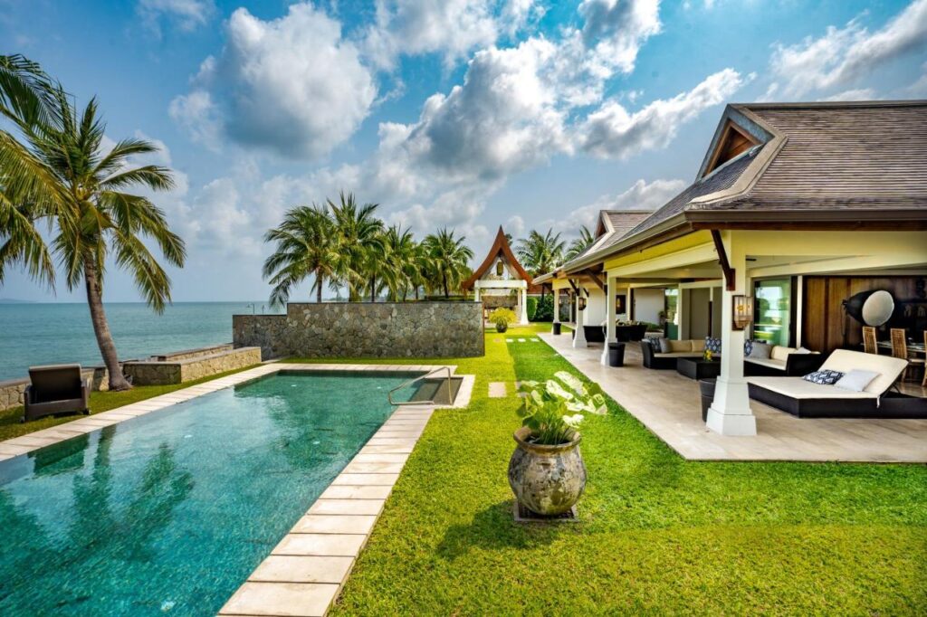 Luxury beachfront villas with private pools in Koh Samui at sunset